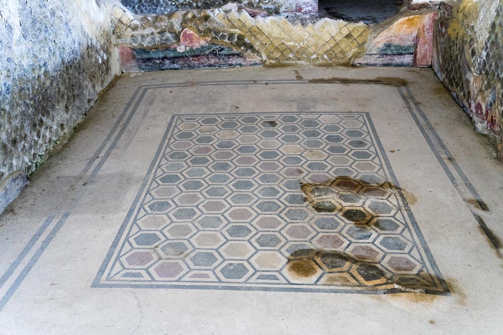 Herculaneum Villa dei Papiri. October 2023. Room (f), looking north across flooring. Photo courtesy of Johannes Eber.
